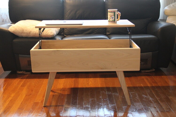Coffee table with lift top
