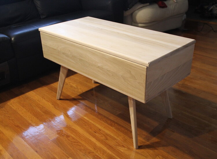 Coffee table with lift top