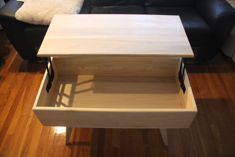 Coffee table with lift top