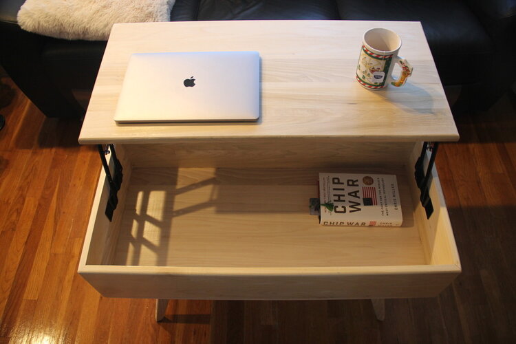 Coffee table with lift top